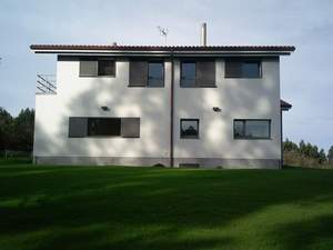 Fachada tarsera: Vivienda-Unifamiliar 