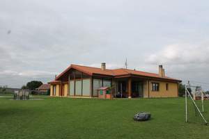Fachada principal y lateral  :Vivienda-Unifamiliar