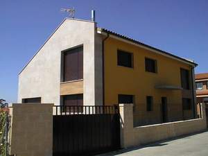 Fachada trasera y lateral :Vivienda-Unifamiliar 