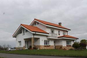 Fachada principal y lateral 2  : Vivienda-Unifamiliar 