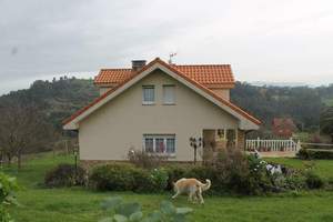 Fachada lateral :Vivienda-Unifamiliar 
