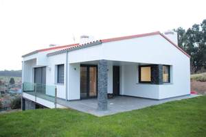 Fachada principal  y lateral   : Vivienda-Unifamiliar 