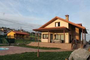 Fachada principal y lateral   :Vivienda-Unifamiliar 