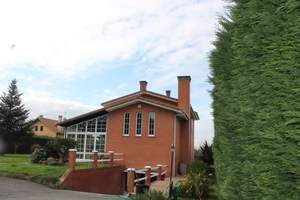 Fachada  lateral :Vivienda-Unifamilar 
