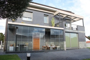  Fachada trasera :Vivienda-Unifamiar 